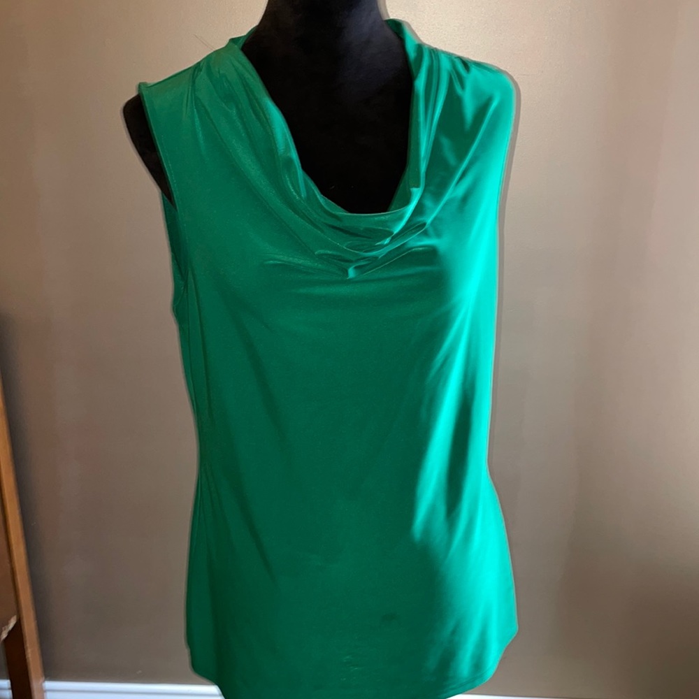 Green blouse with cascading neckline